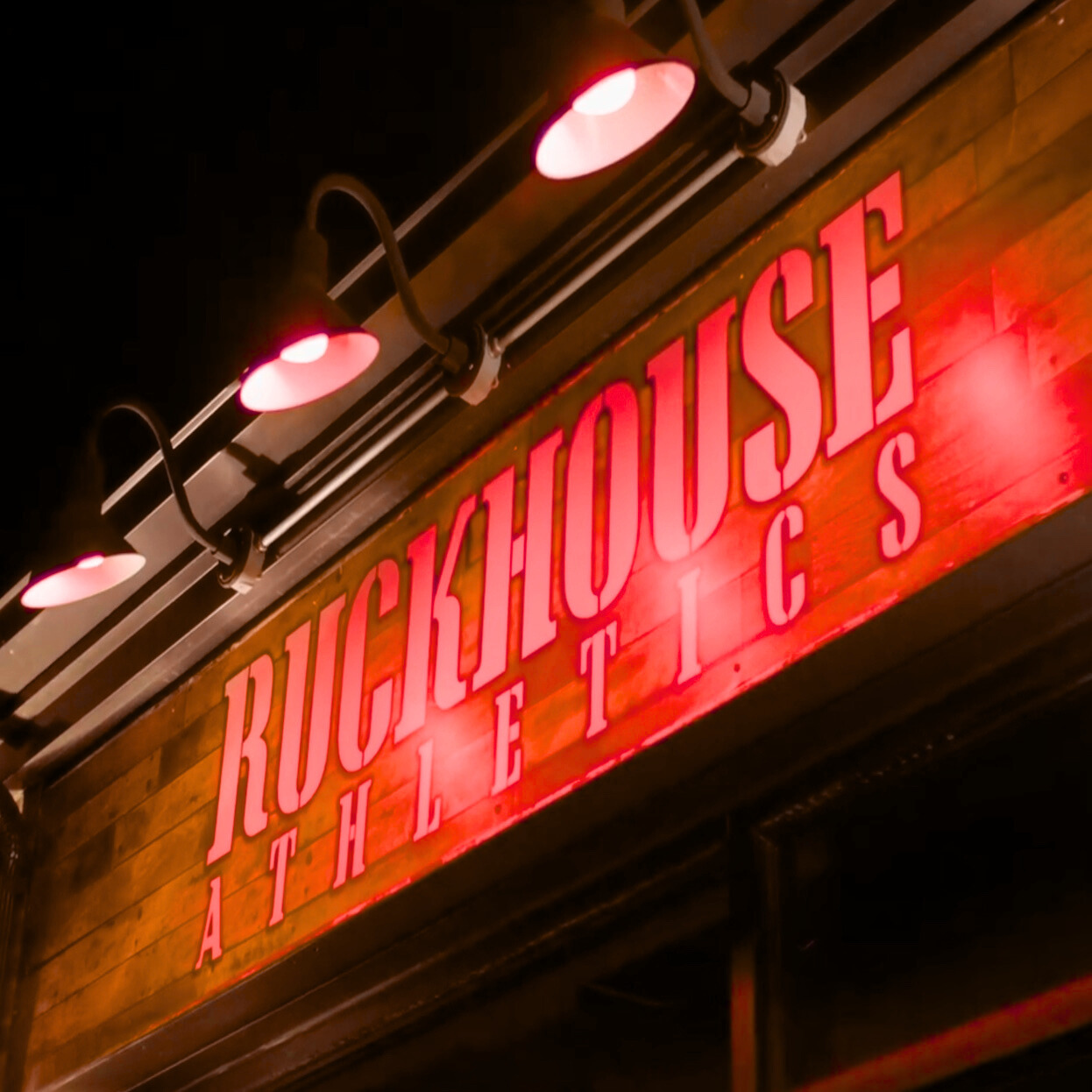 Ruckhouse Athletics gym at night
